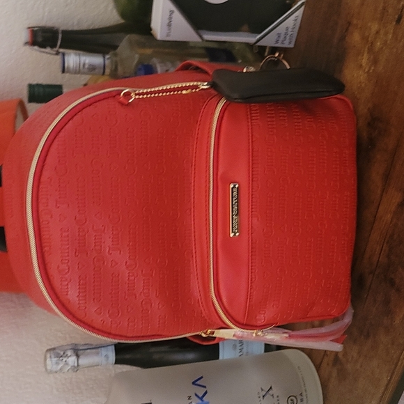 Juicy Couture Handbags - Juicy couture lipstick red deboss backpack